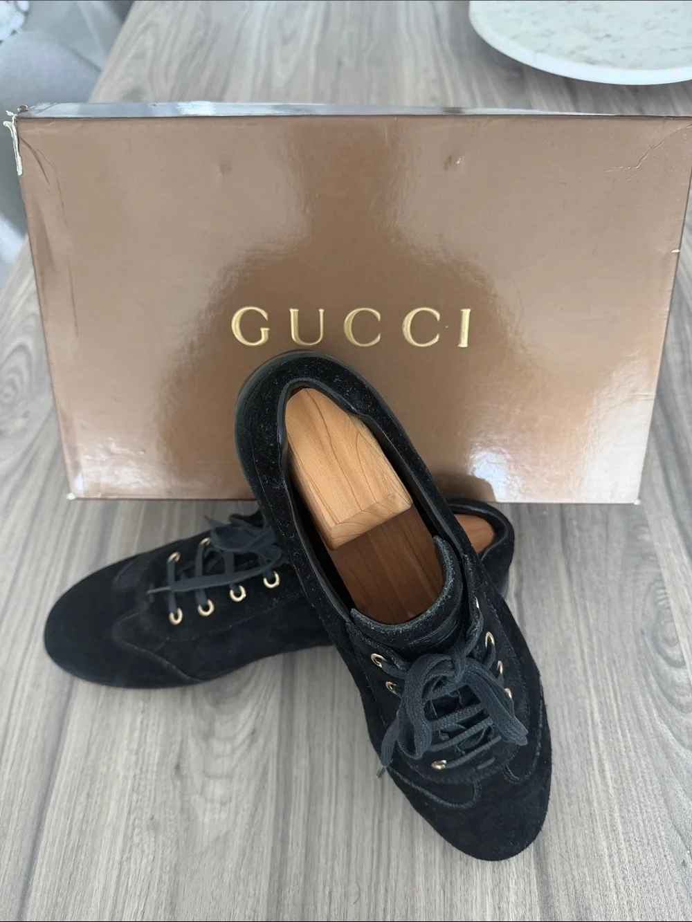 Gucci Men's Black Suede Sneakers with Gold Eyelets